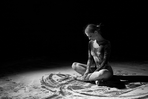 Female adult ballet dancer performer in flour. 