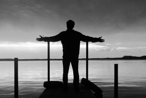 Man embracing the sunset.