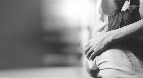 Husband embracing wife's shoulder to support each other ,Relationship care concept ,comforting family members ,mutual encouragement,tenderness ,comfort and sympathy ,helping ,giving hope.