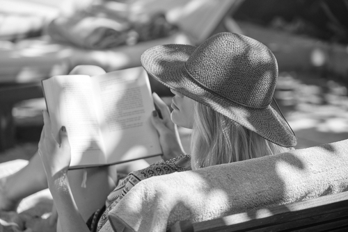 Women relaxing, happy, reading a book, story 