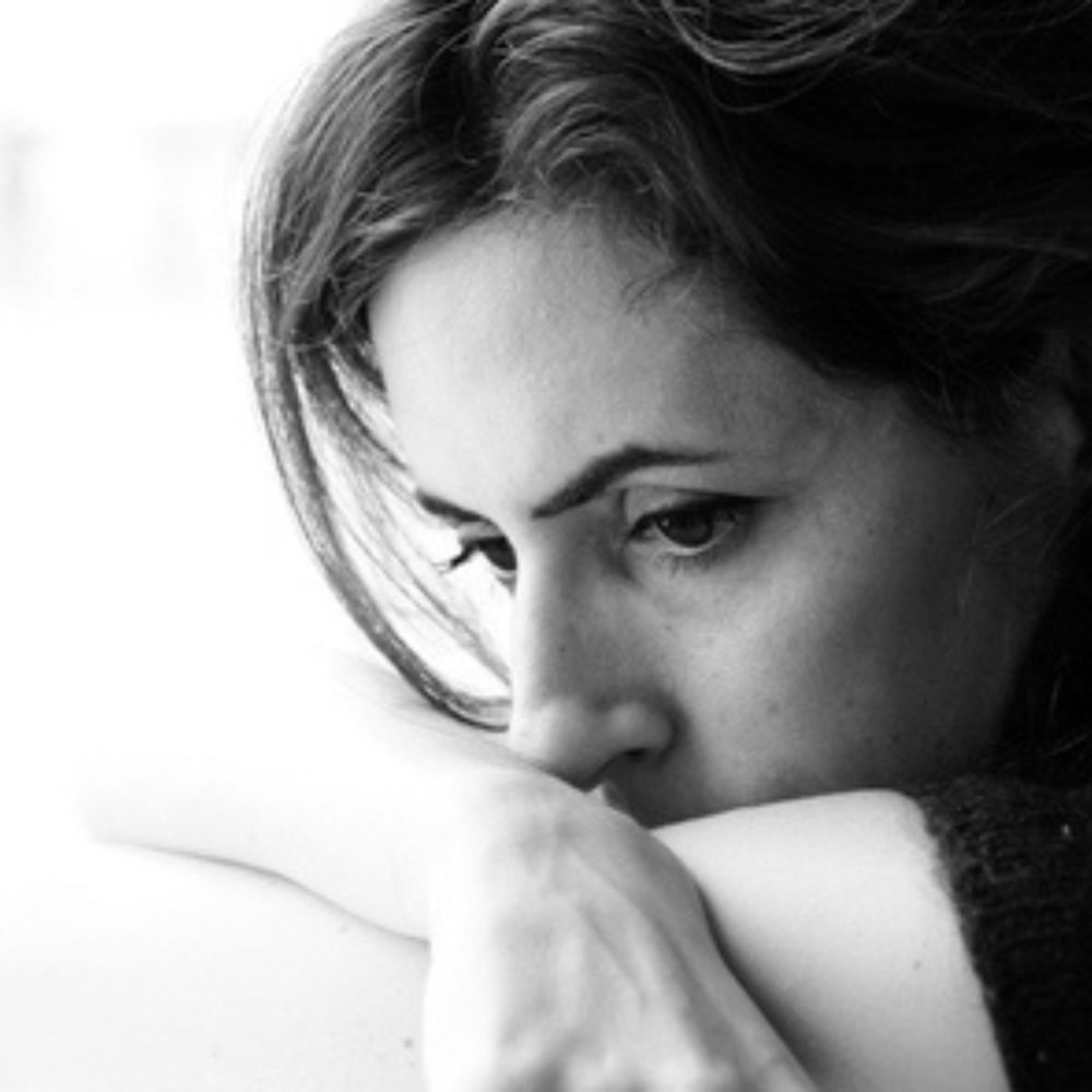 woman looking distraught