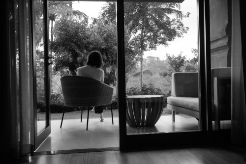 Female outside in the yard, just outside a window - image of hope 