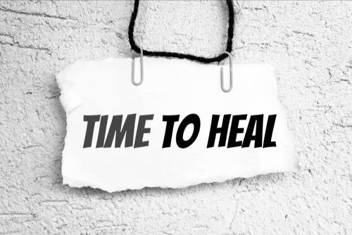 Sign saying: "Time to Heal"