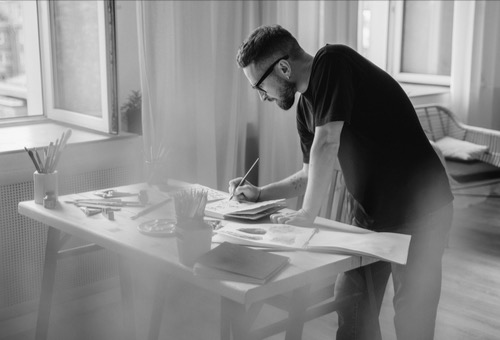 fine artist man doing his creative work 